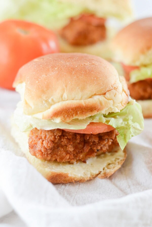 crispy chicken slider on a white surface