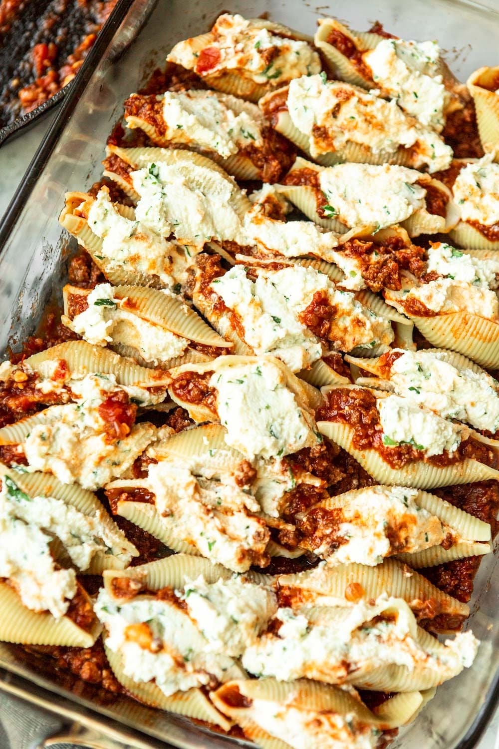 an entire casserole filled with meat sauce and stuffed shells. 