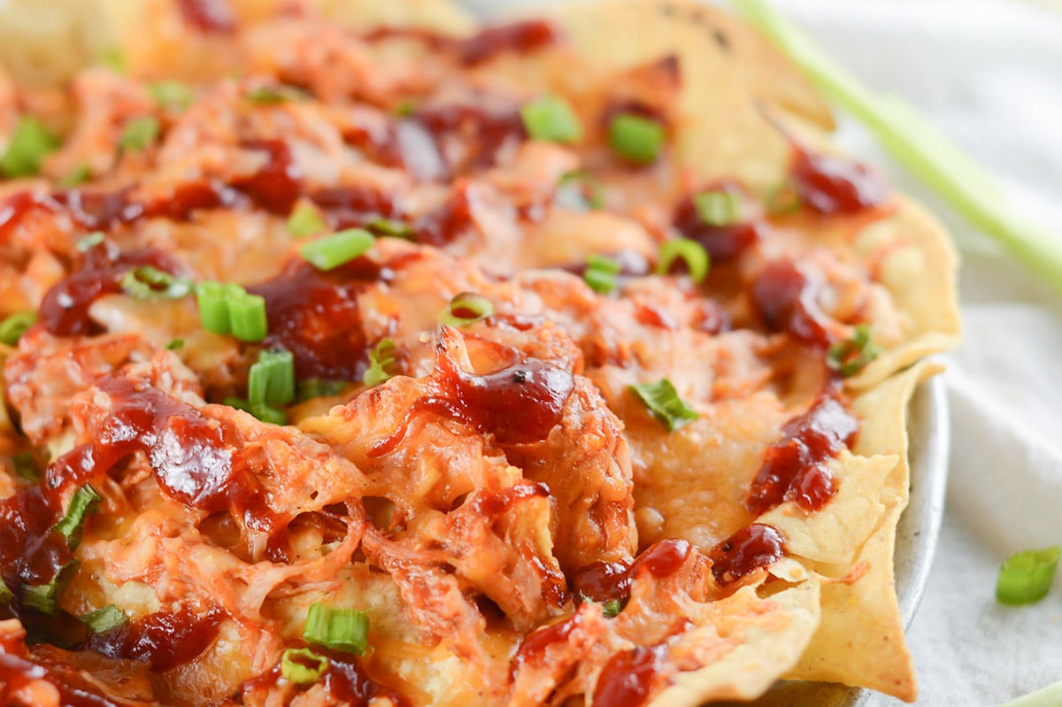 cheesy chicken nachos on a plate 