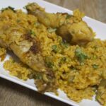 bone in chicken and yellow rice.
