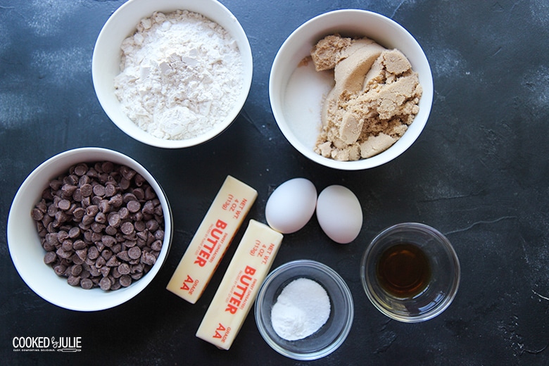 ingredients in small bowls, butter, and eggs