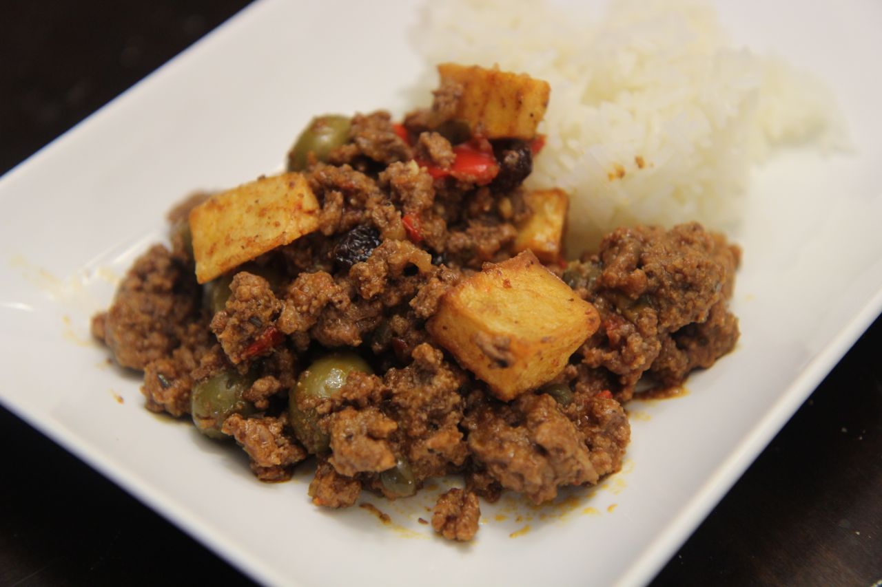 One healthy serving size of picadillo with white rice