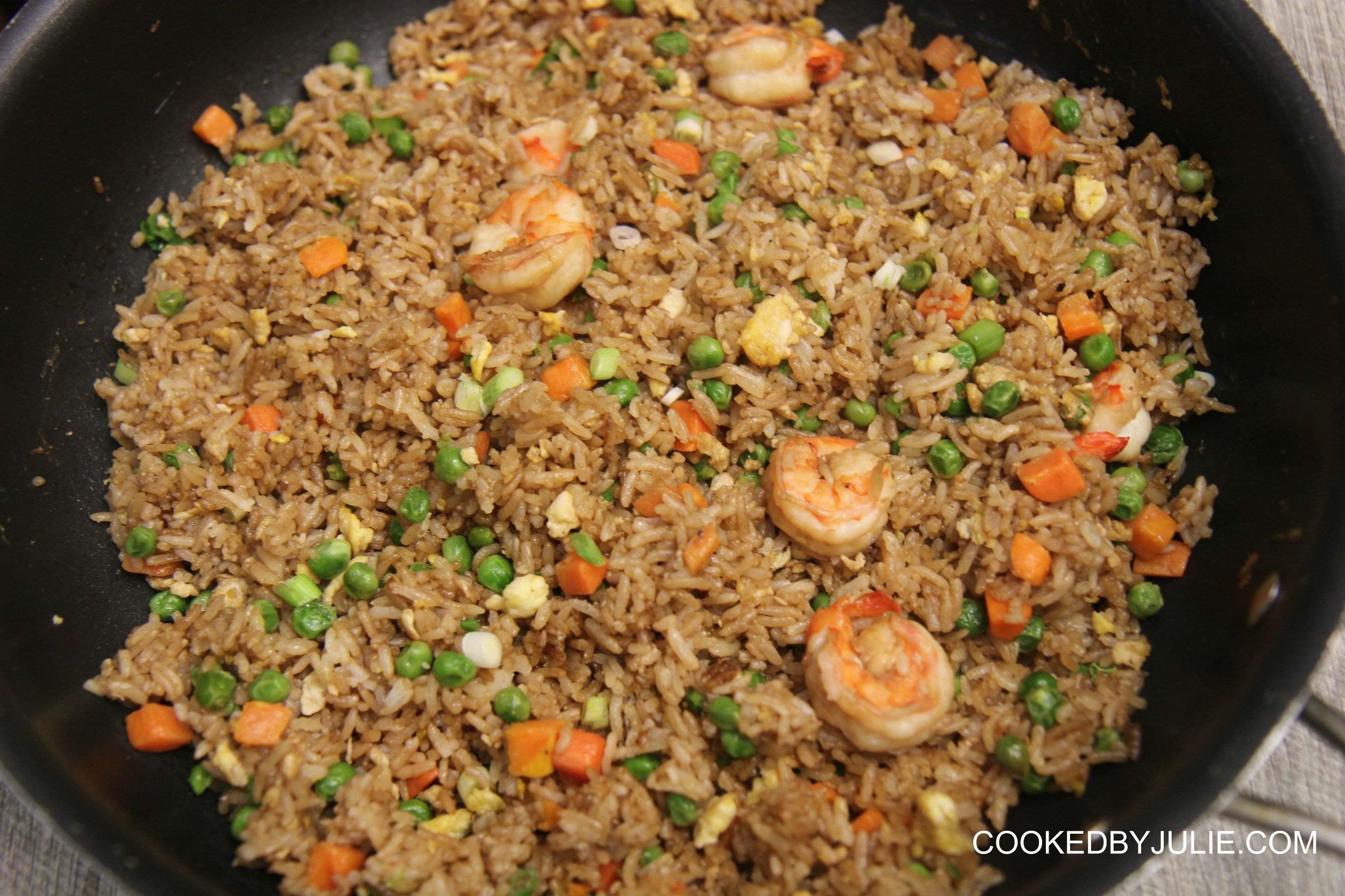 Your favorite takeout fried rice can now be made right at home! This shrimp fried rice recipe is better than takeout and easy to make!