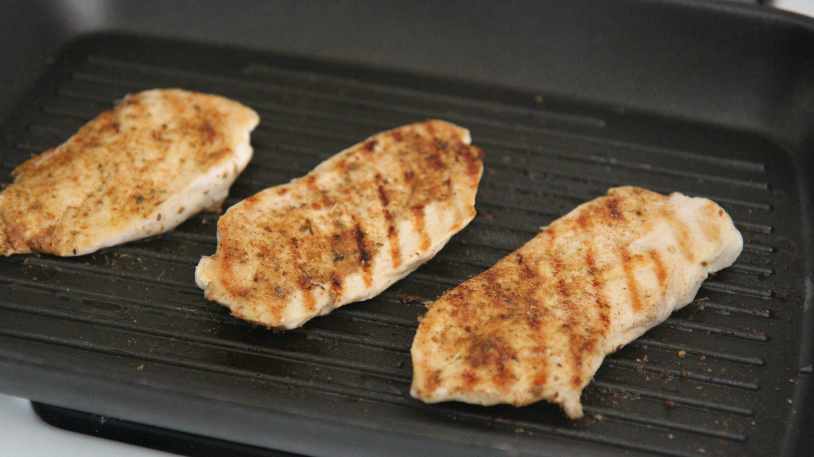 Grill or pan-fry the chicken breasts until cooked through.