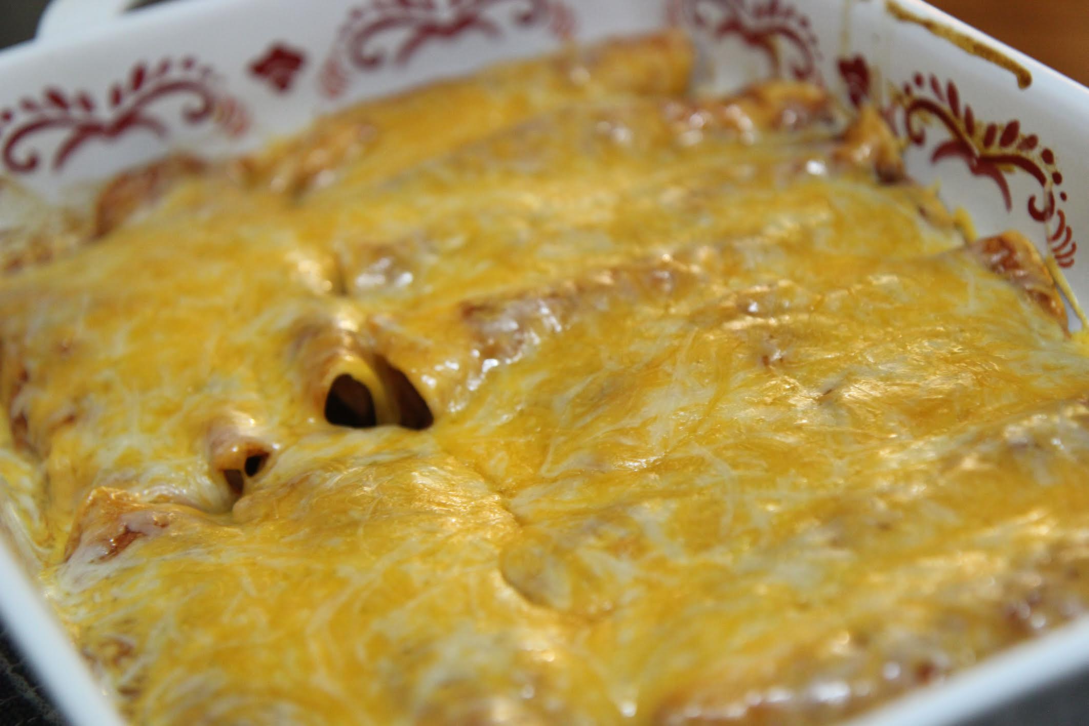 Learn how to make these cheesy chicken enchiladas from scratch for the perfect tex-mex dinner. 