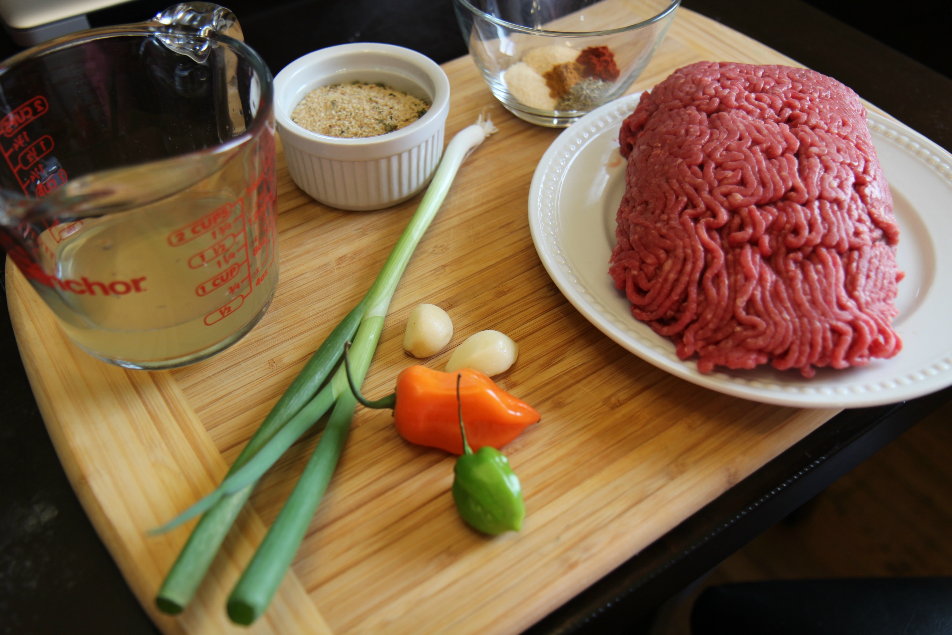 The ground beef and the veggies used to flavor the filling are pictured here. Gather them all up!