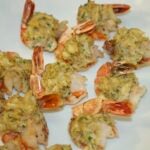stuffed shrimp on a white platter