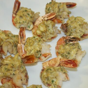 stuffed shrimp on a white platter