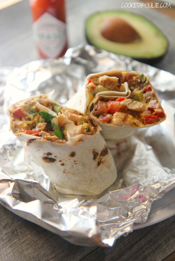 tex mex grilled chicken burrito on aluminum foil.