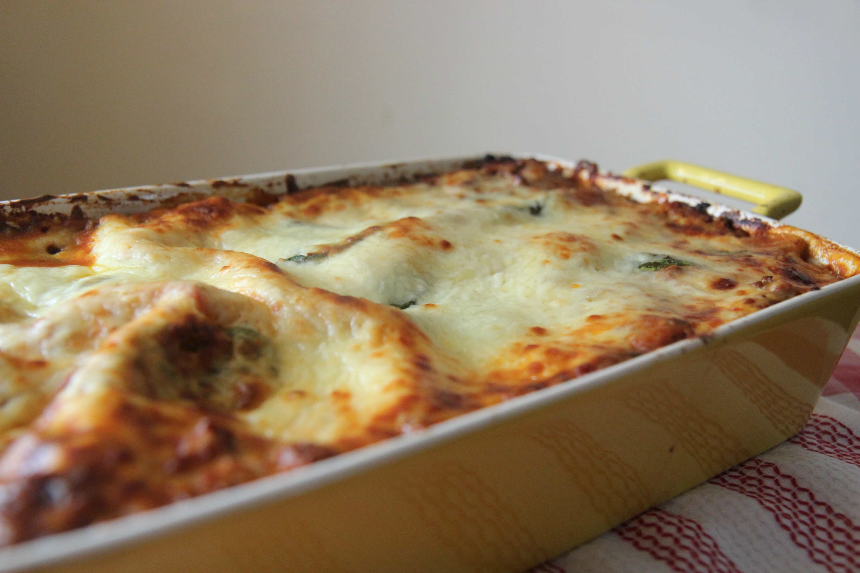 Ultimate lasagna in a casserole up close. 