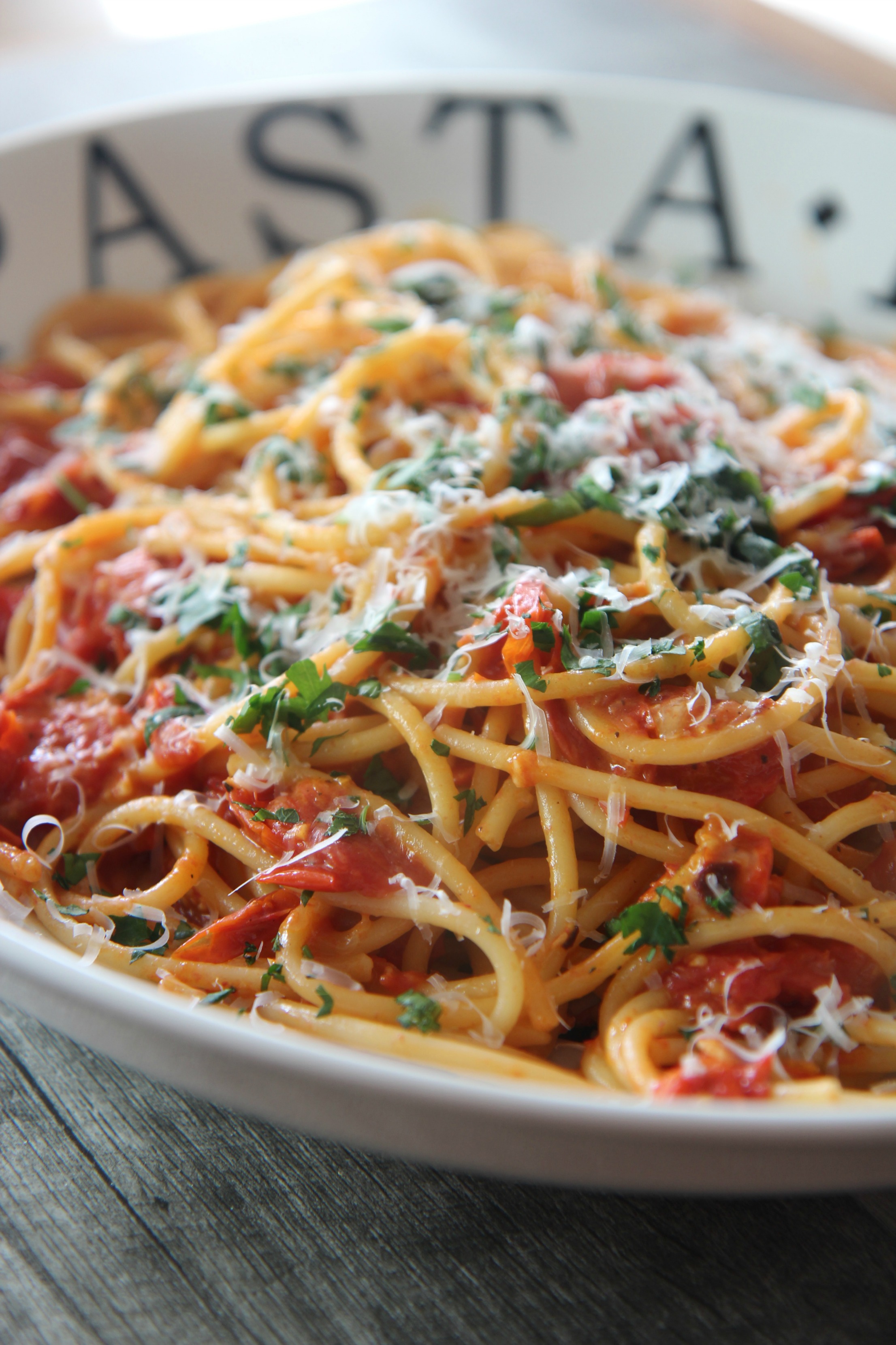 Fresh roasted tomatoes, tender pasta, and a light helping of mozzarella cheese make this a deliciously light pasta dish