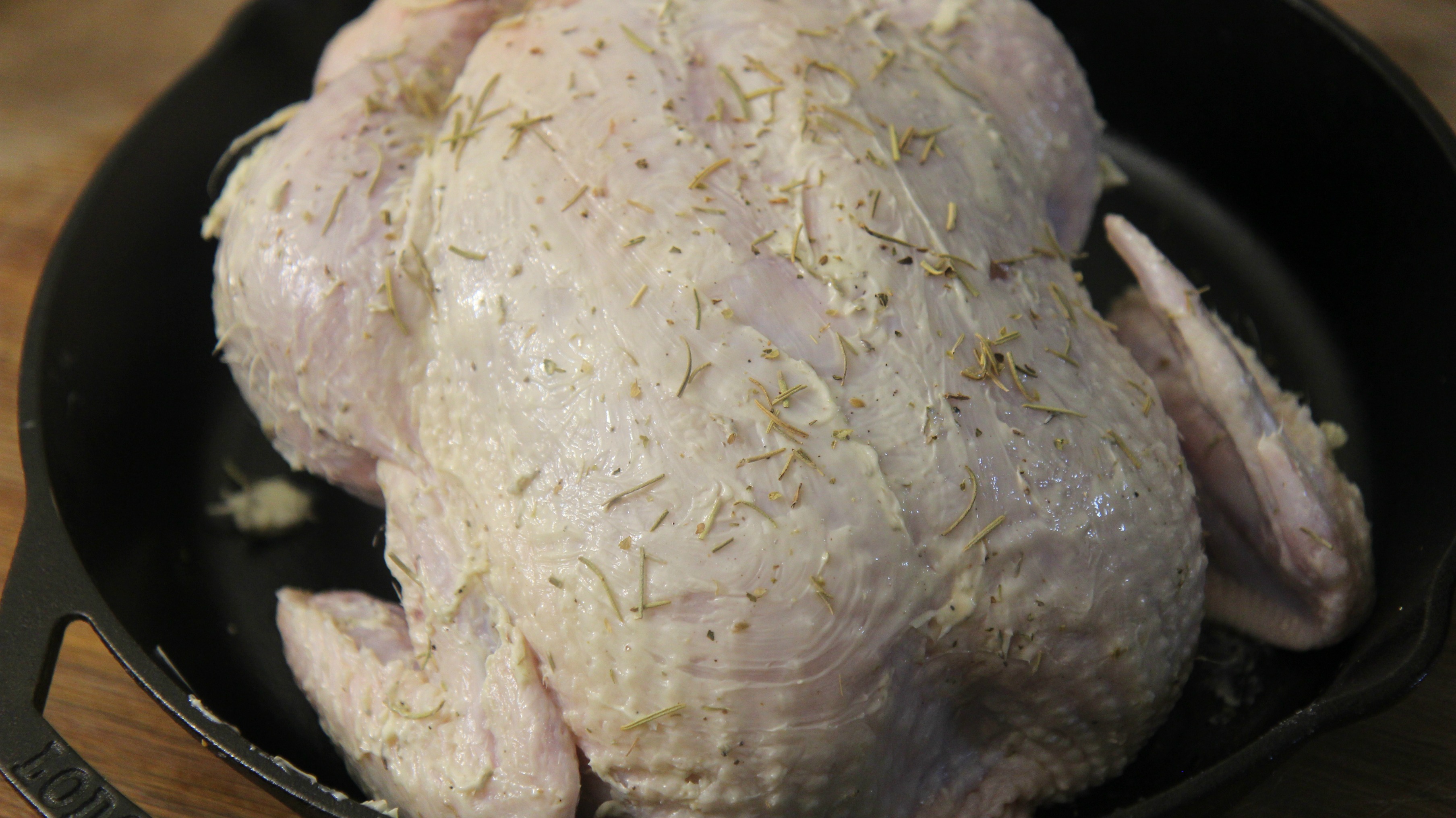 The herb butter rub is the secret to keeping this chicken moist and juicy during the roasting process