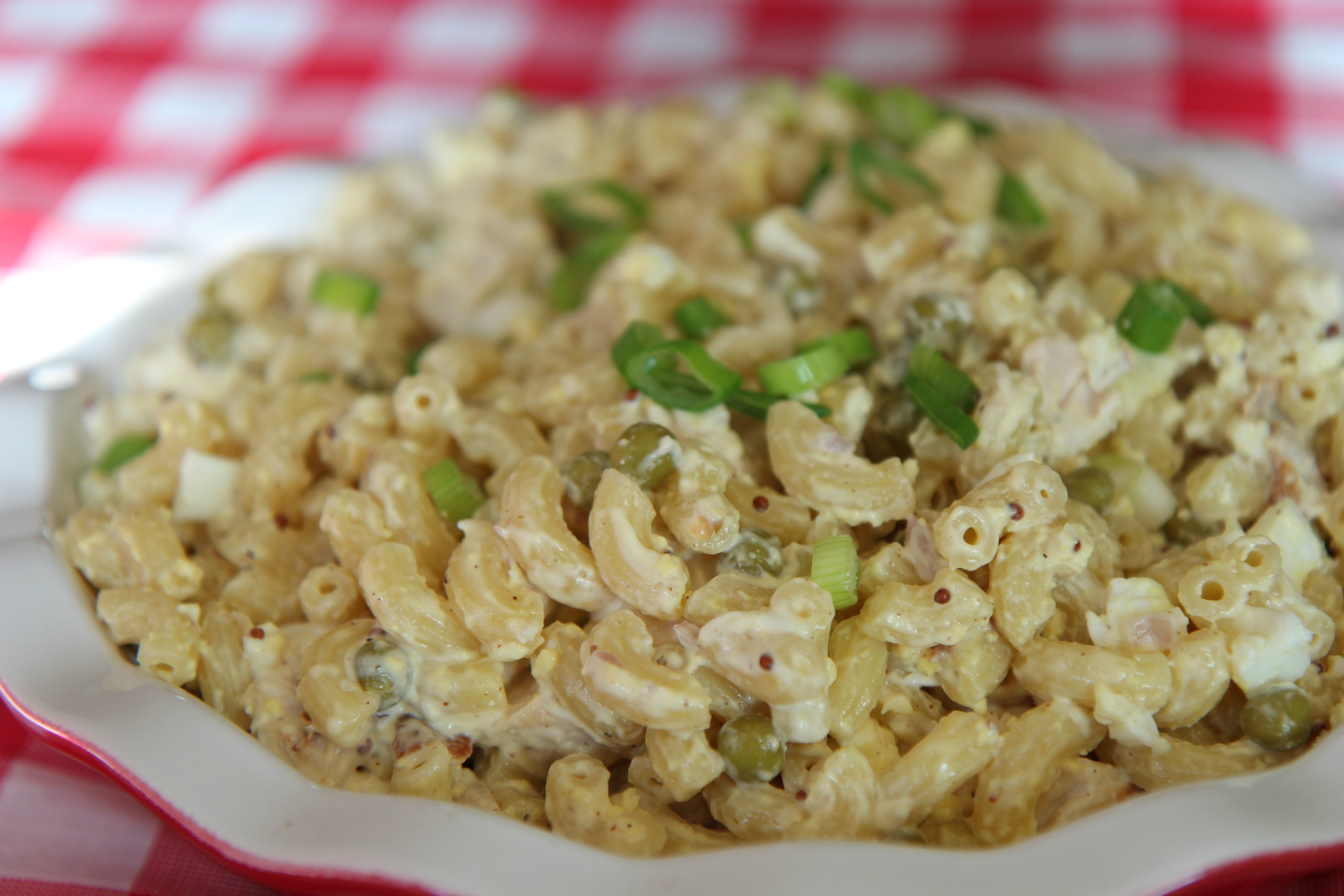 Close up to see the details of the grain mustard in the sauce.