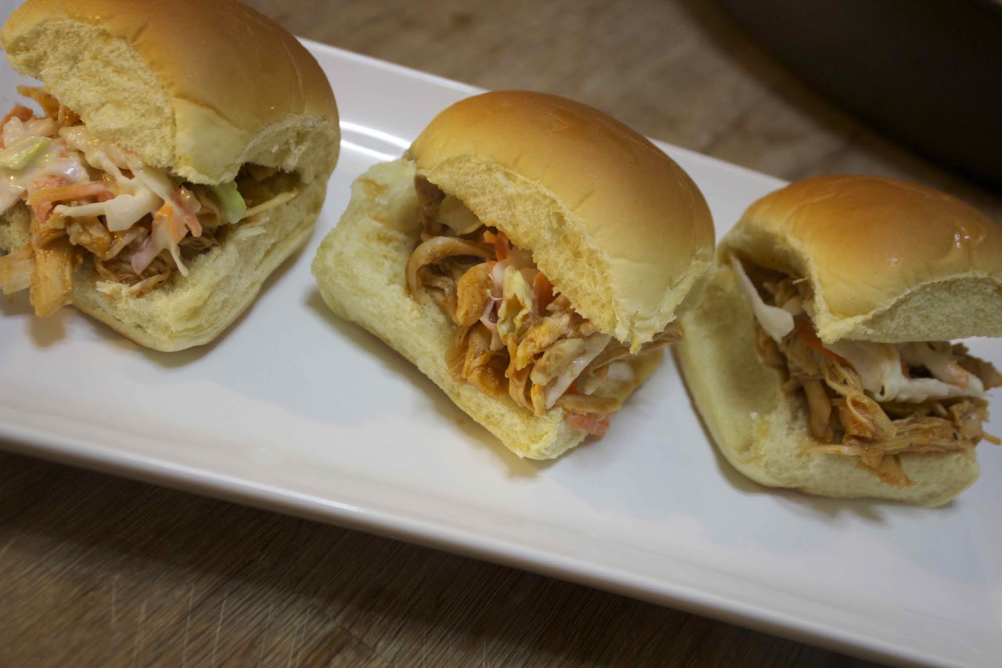 These BBQ pulled chicken sliders are made with a delicious homemade BBQ sauce that's super easy to make with common ingredients
