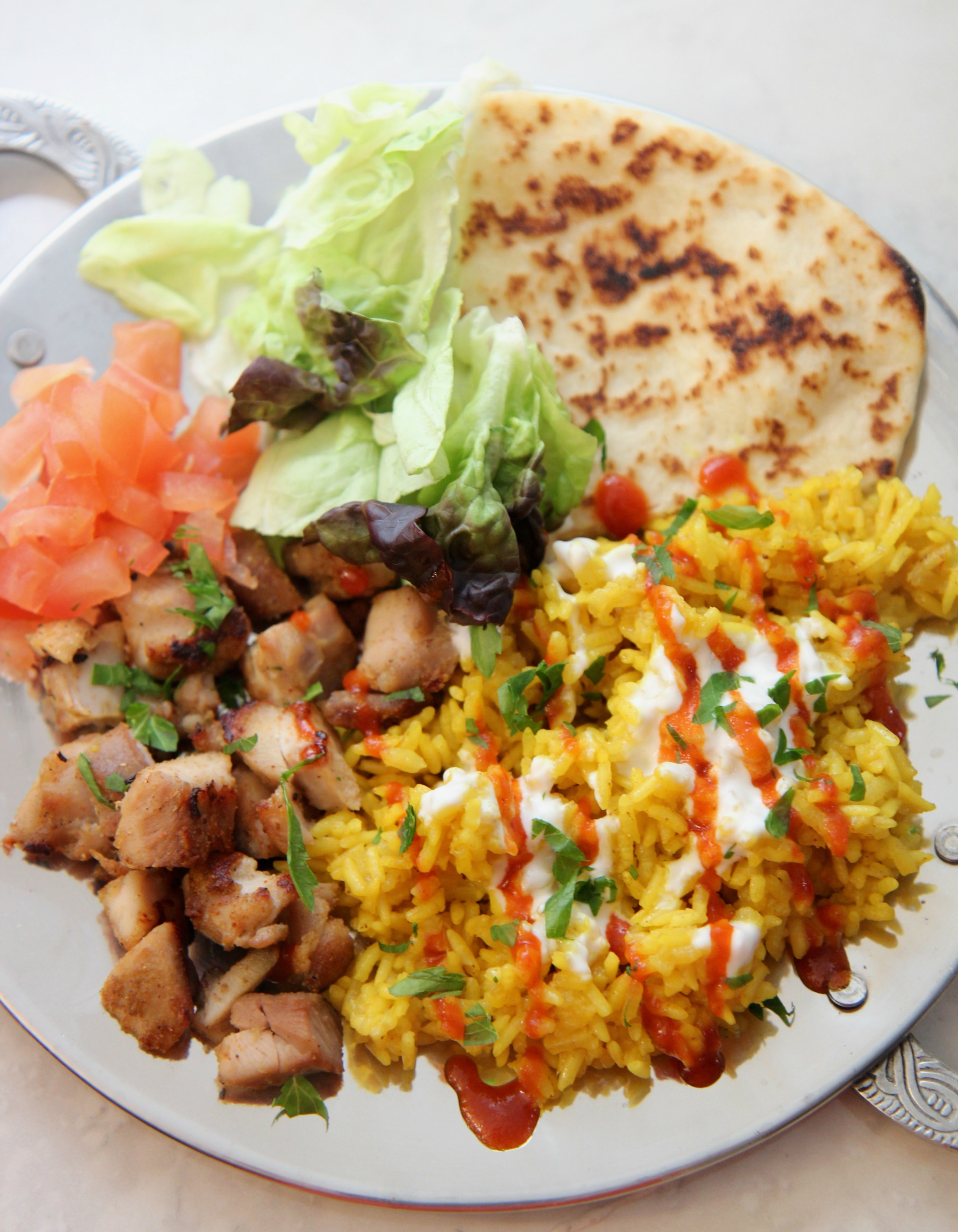 This Halal guys chicken and rice recipe is similar to what you'd get at a lunch cart in NYC.