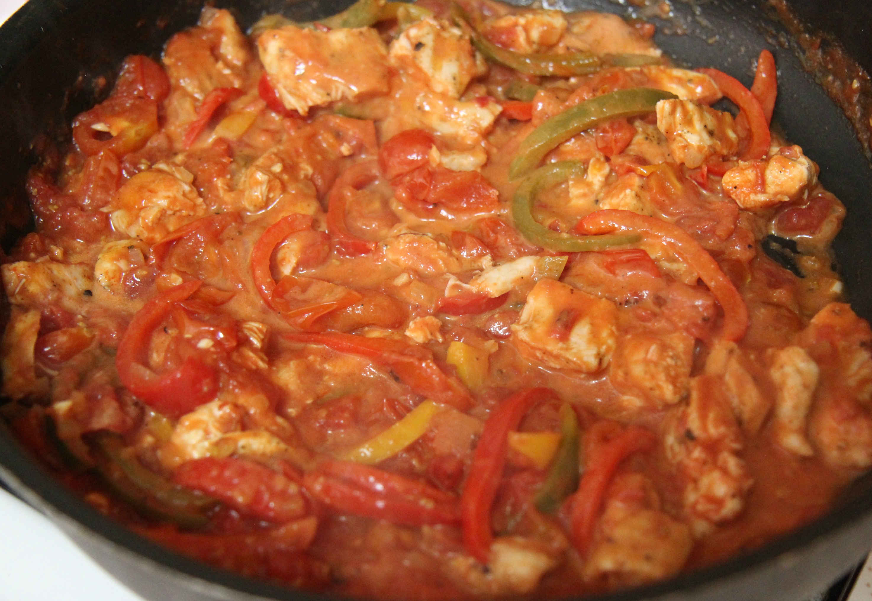 Add some heavy cream to help thicken the pasta sauce.