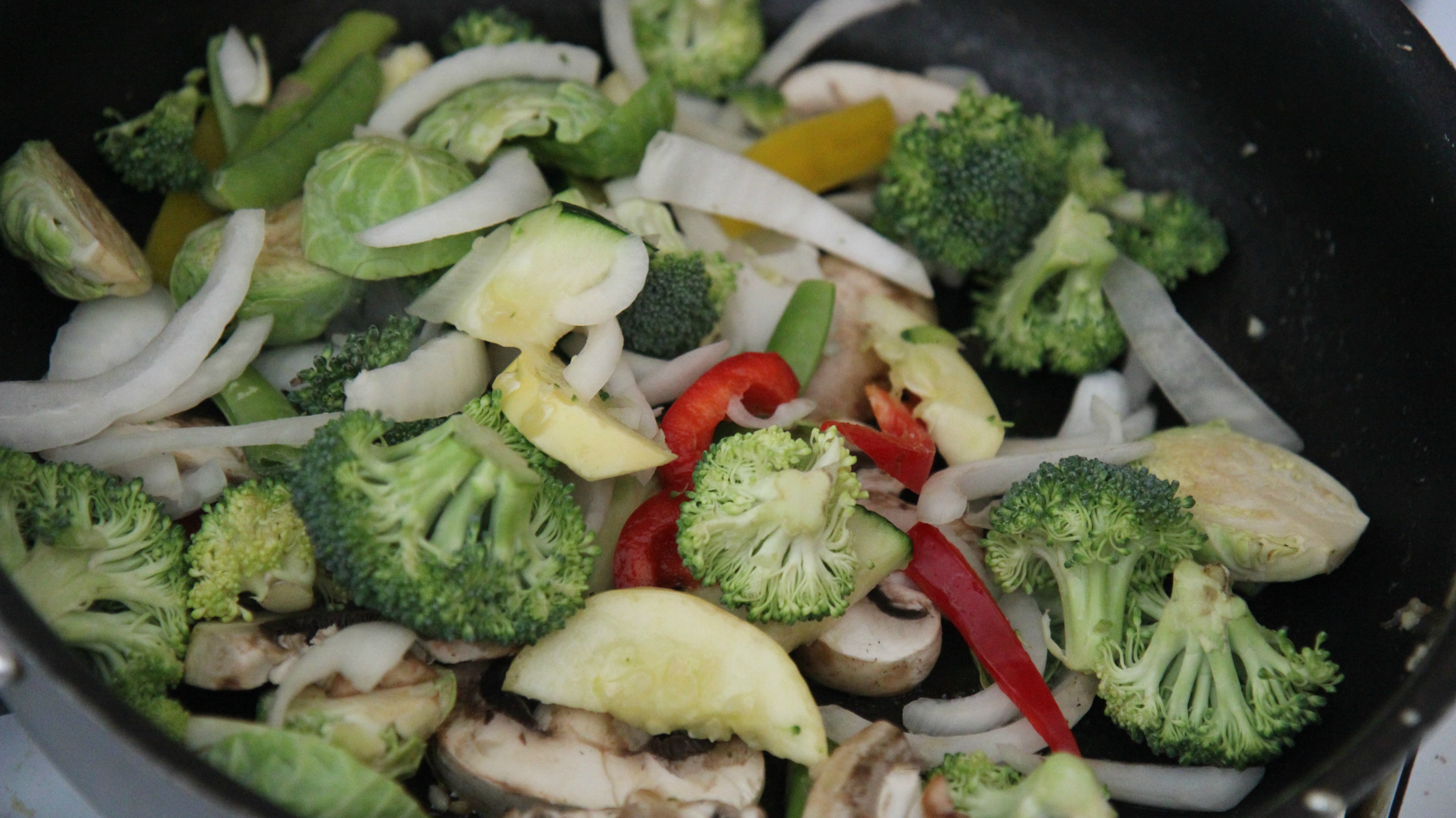 Raw vegetables in a black skillet 