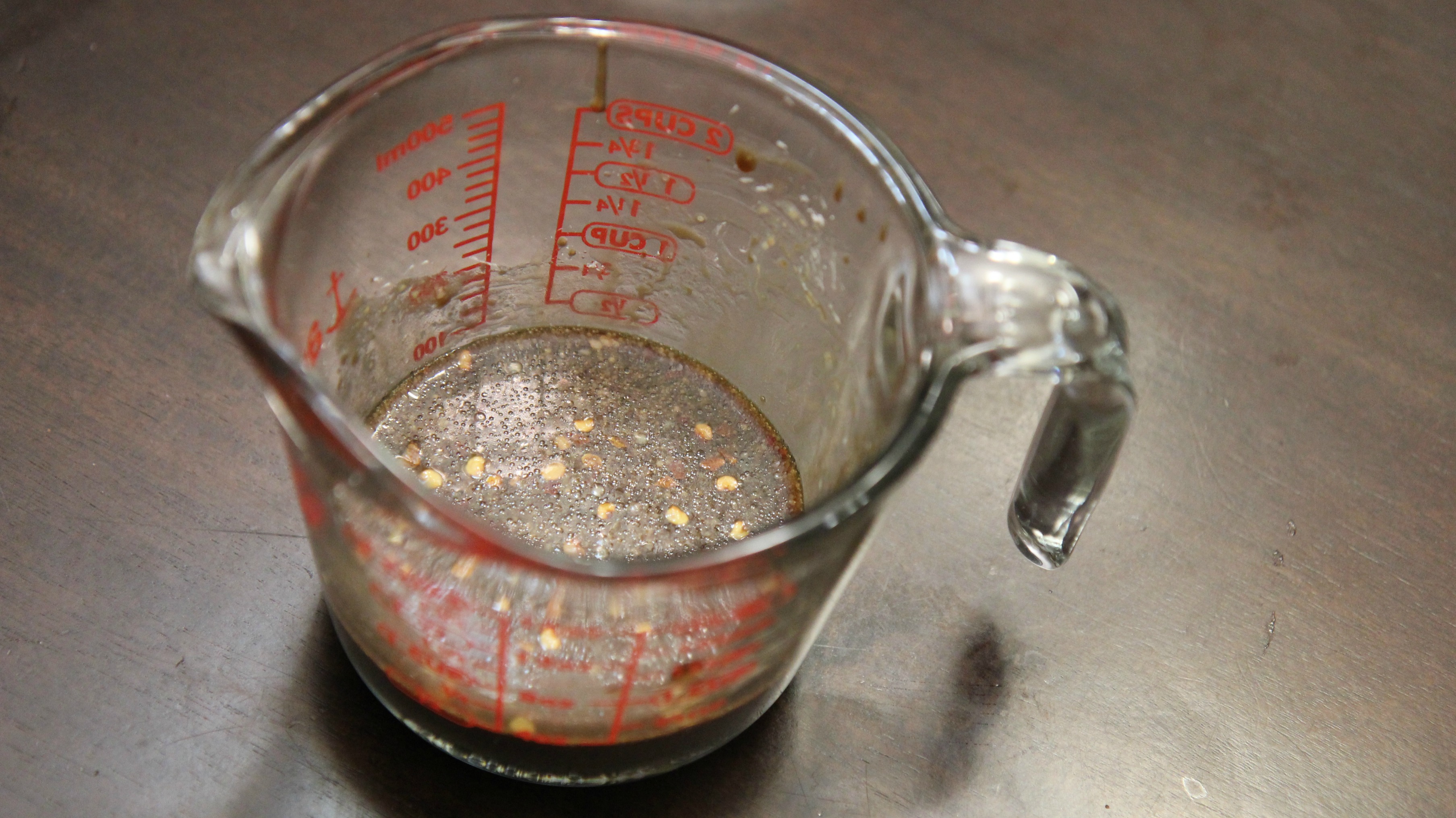 Soy Sauce in a measuring cup. 