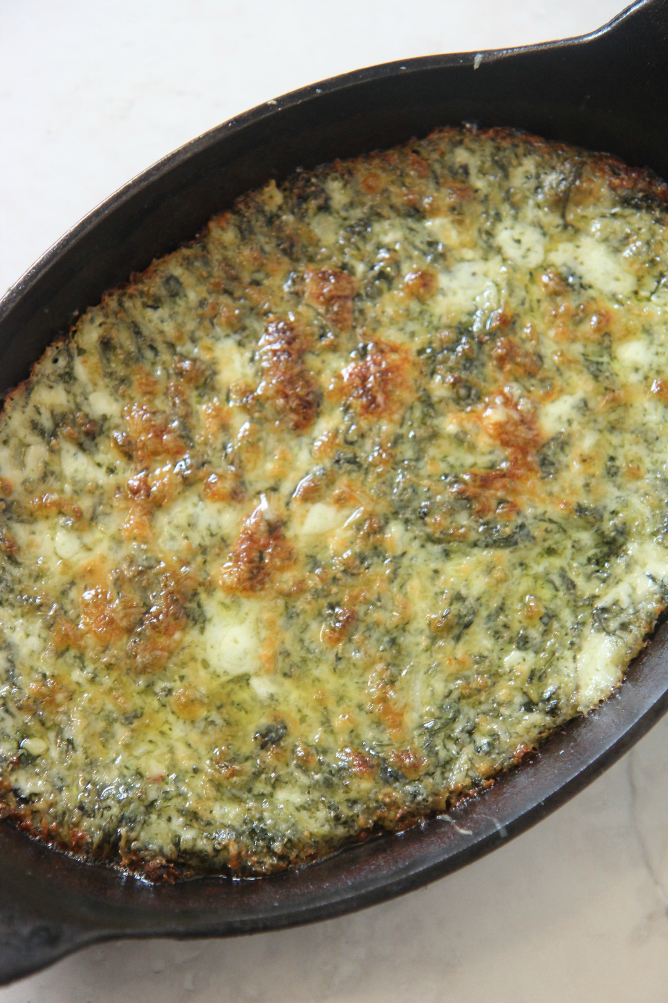 Bake the creamed spinach dip for a crispy, cheesy crust that's perfectly party ready. 
