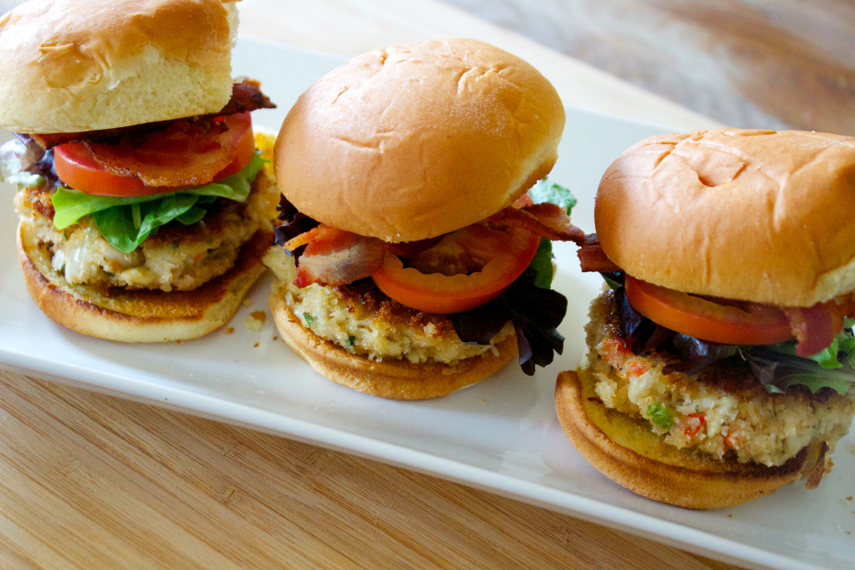 Crab sliders with bacon, lettuce, and tomato. 