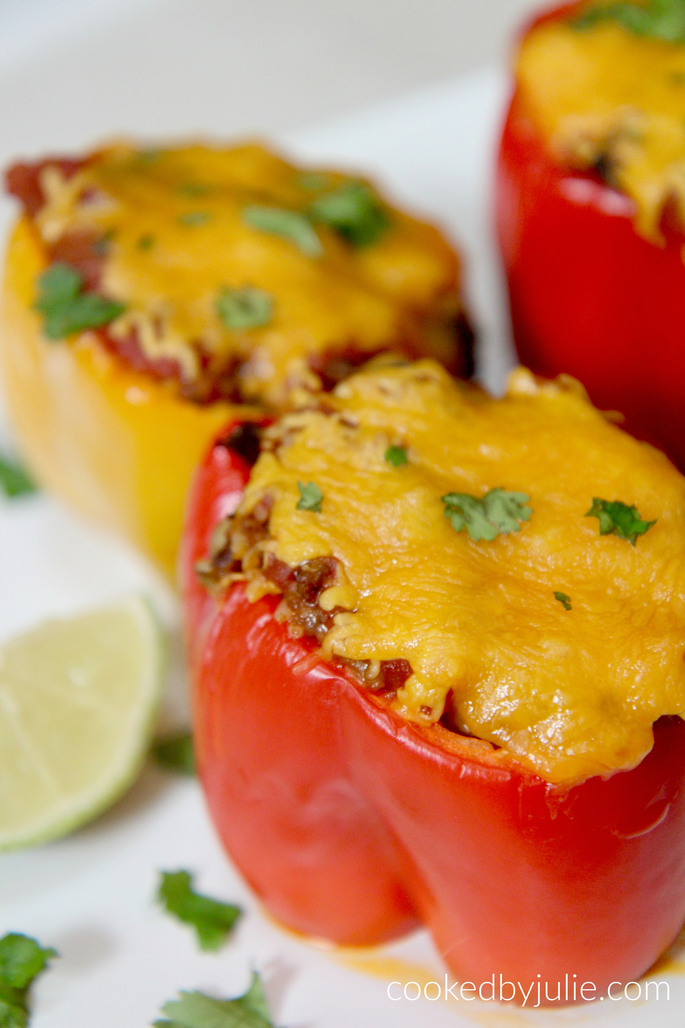 These taco stuffed peppers are a super easy, cheesy, and delicious weeknight dinner