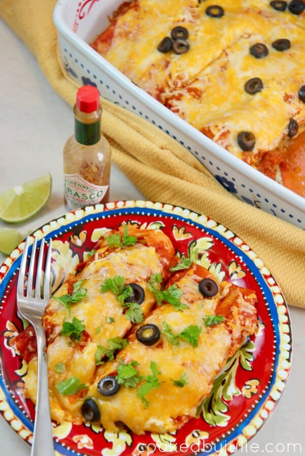 beef enchiladas, hot sauce, and lime.