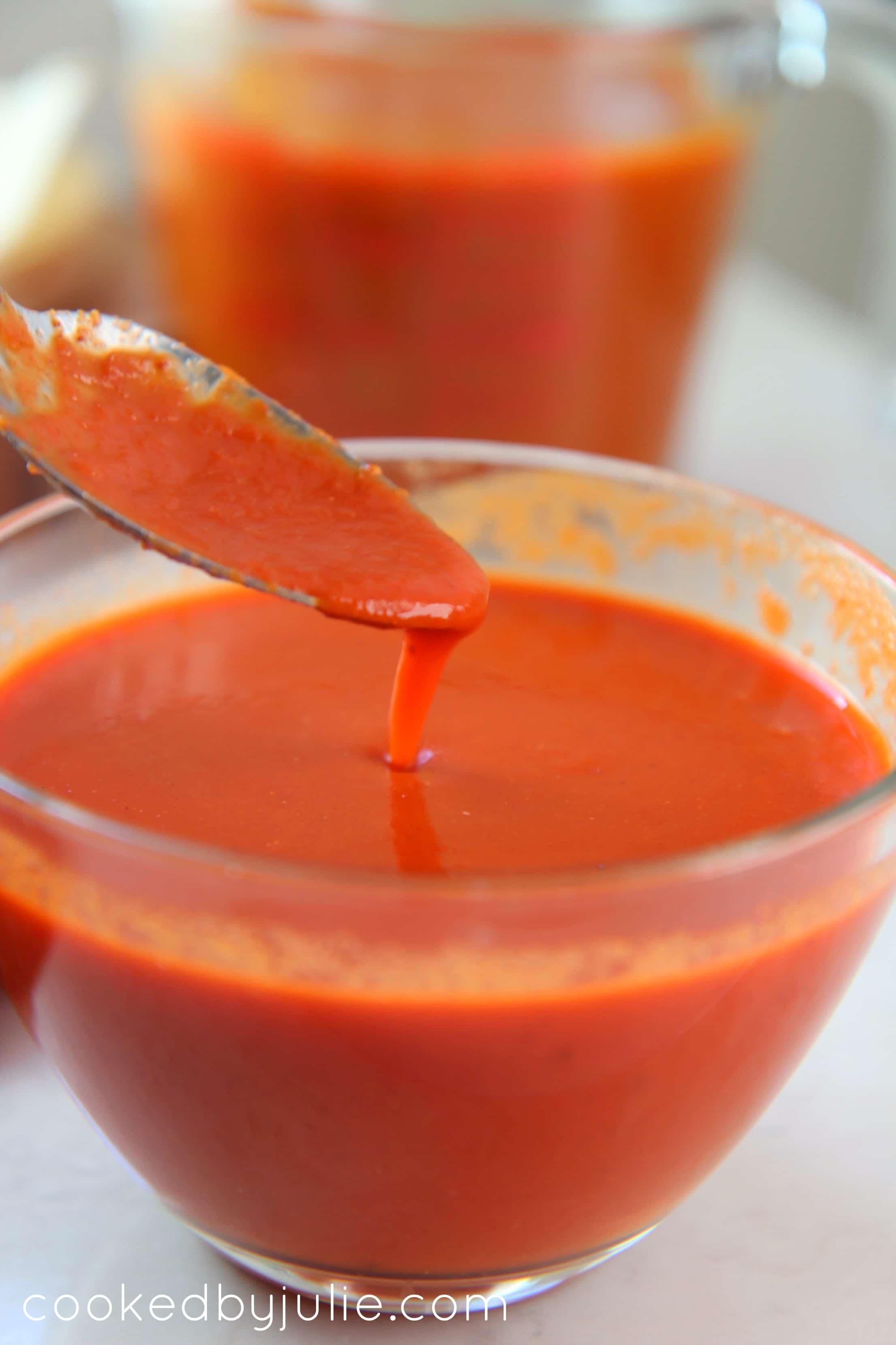 Homemade red enchilada sauce in a small bowl 