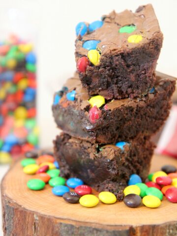 stacked chocolate brownies with m&ms