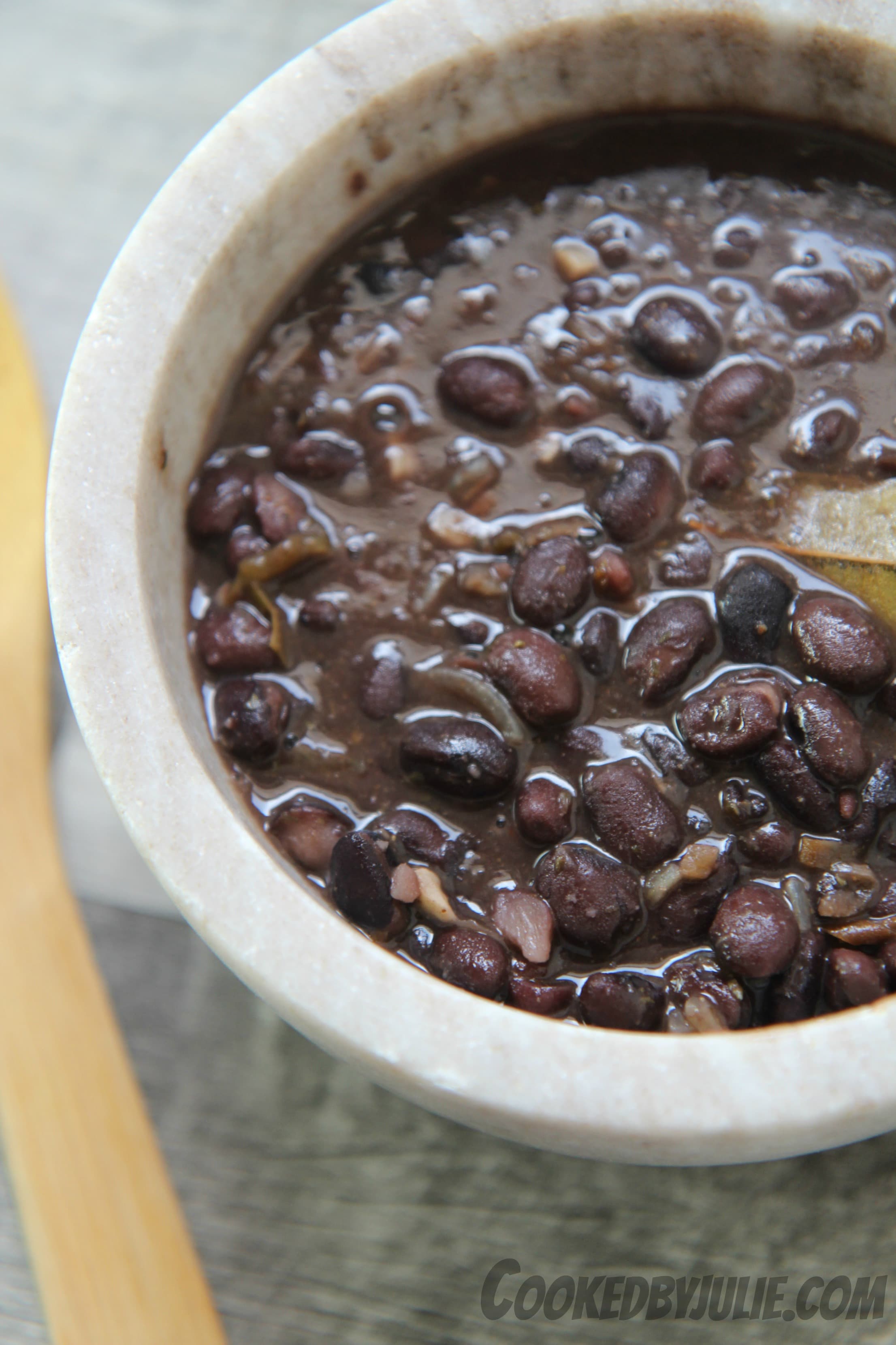 Cuban black beans are best served over rice - add some shredded chicken for a delicious dish