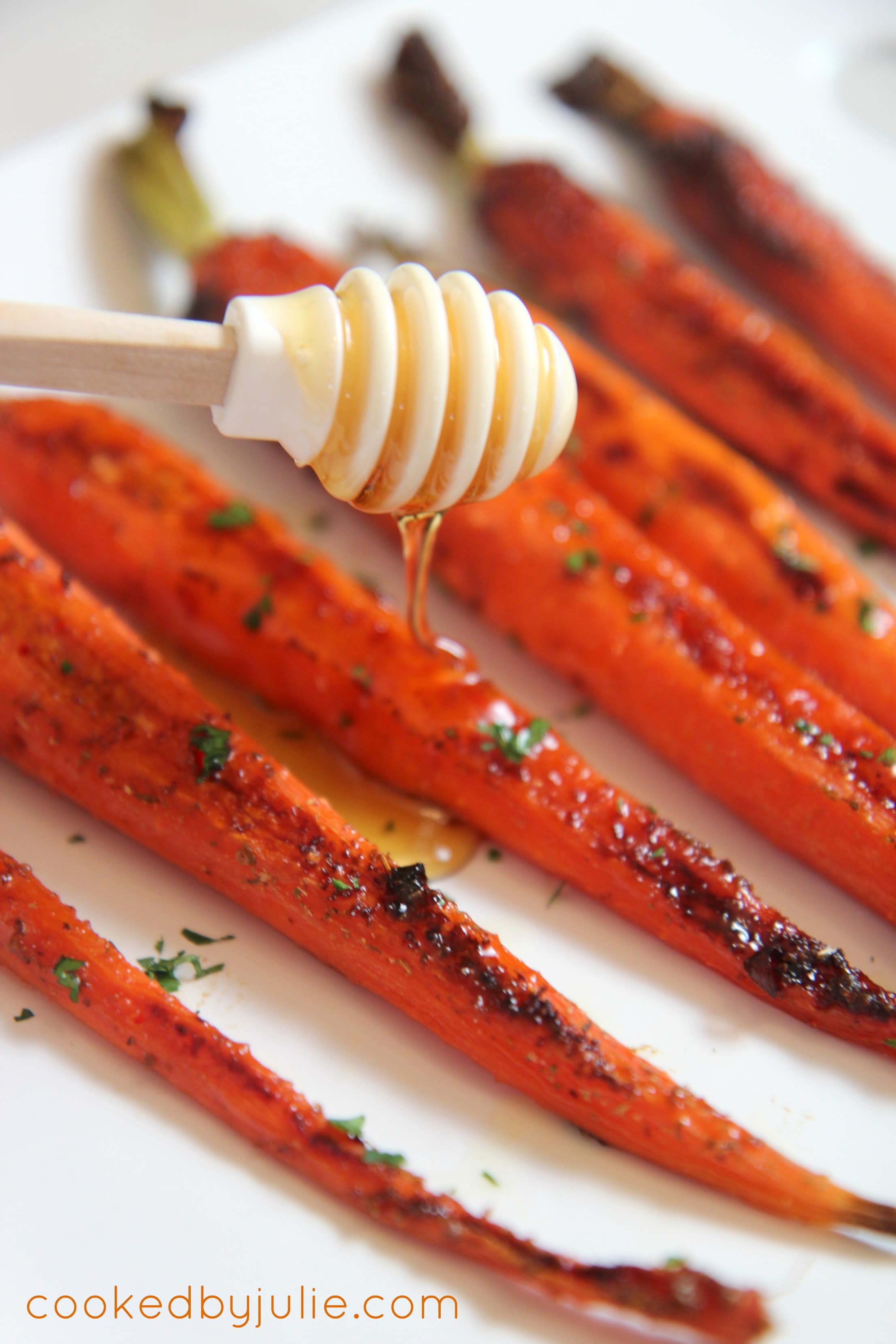 honey glazed garlic roasted carrots make a simple holiday side dish that's ready in minutes