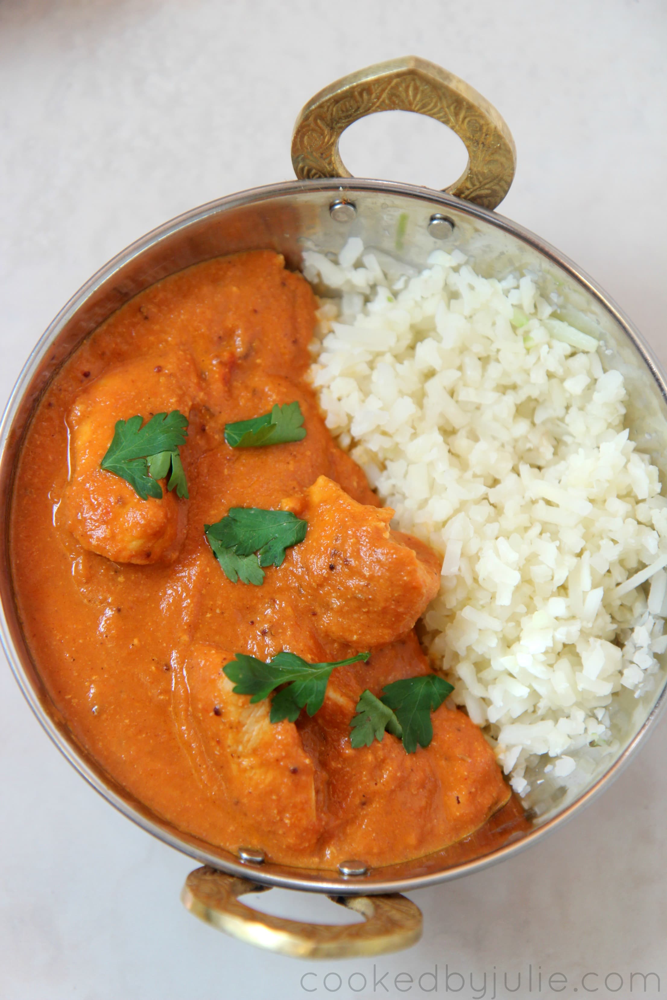 keto butter chicken served in a delicious low carb tomato sauce and served with cauliflower rice