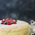 Japanese Cotton Cheesecake with fresh fruit and powdered sugar