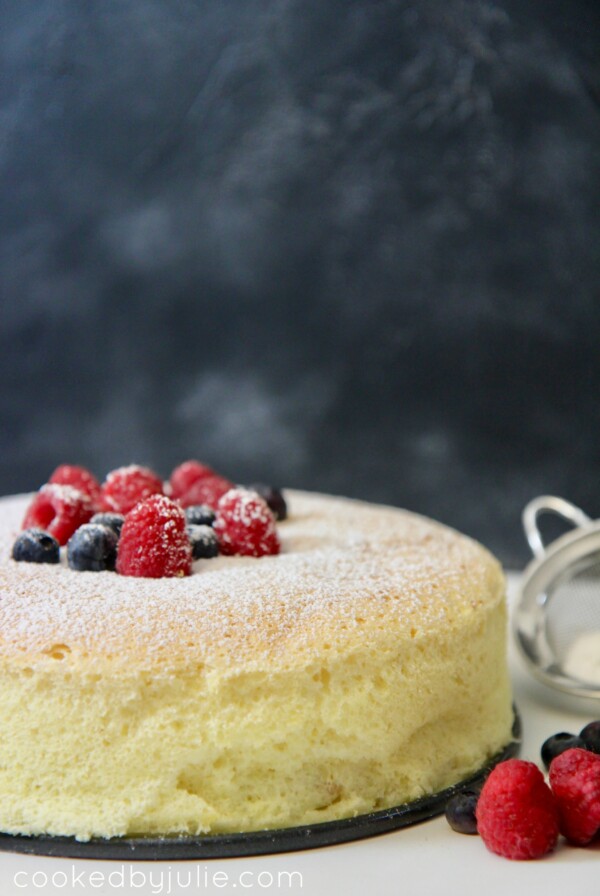 Japanese Cotton Cheesecake with fresh fruit and powdered sugar
