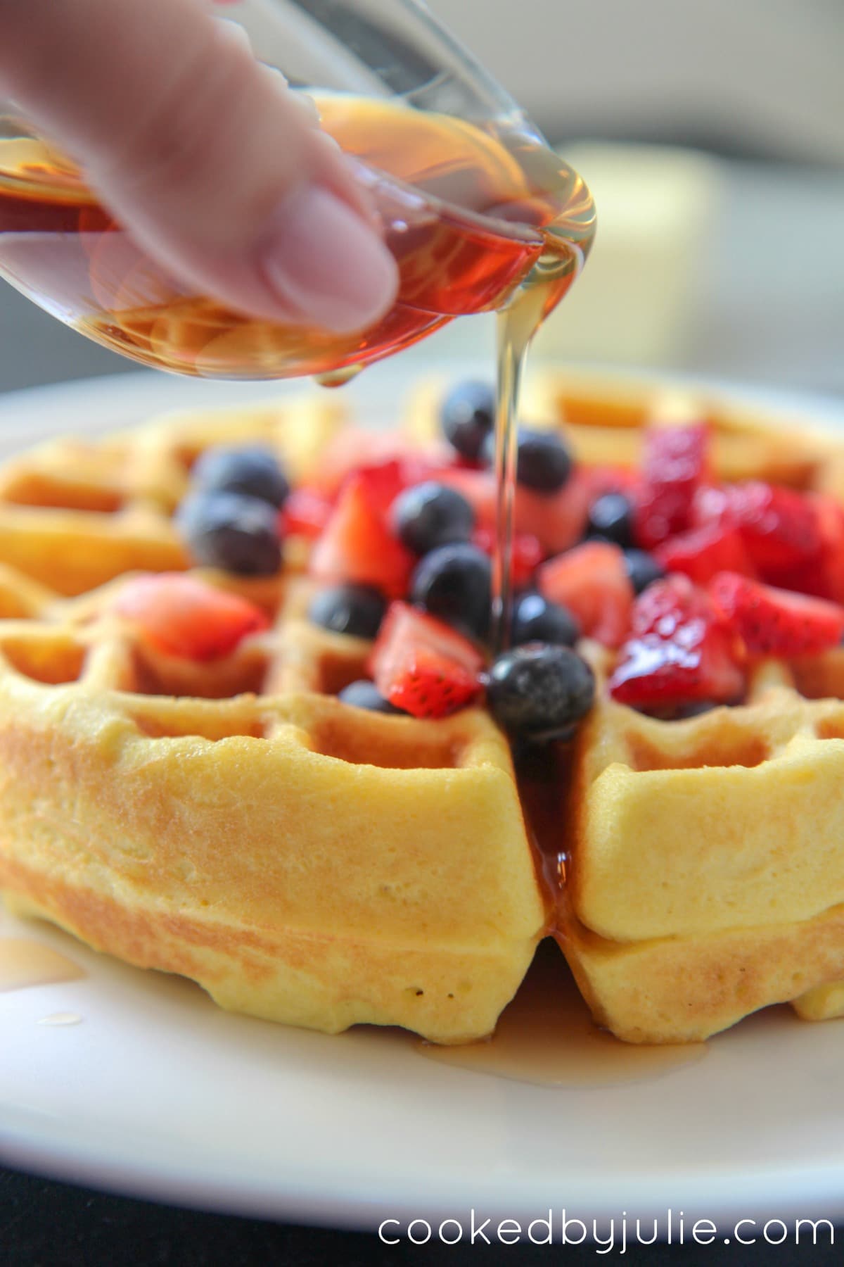 Keto waffles with syrup and fruit