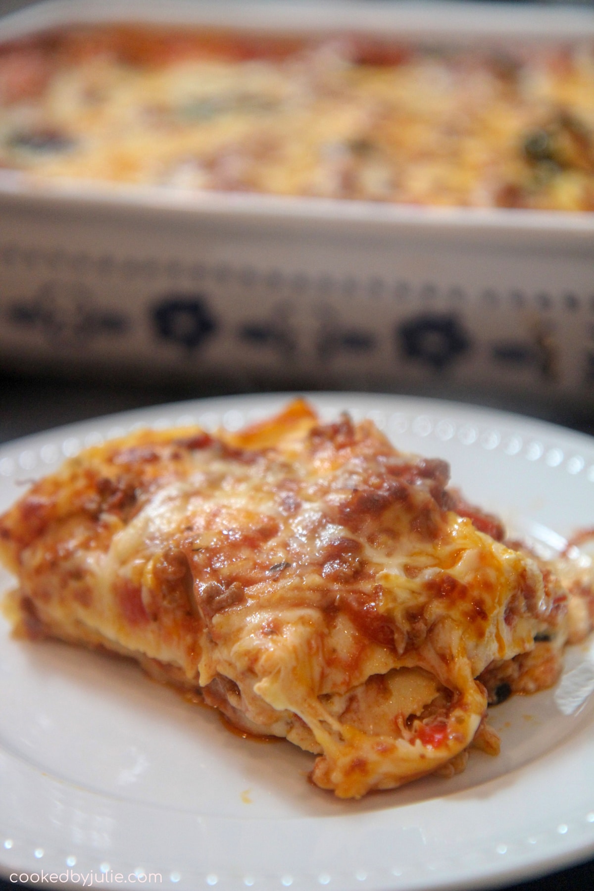 a serving of lasagna on a plate