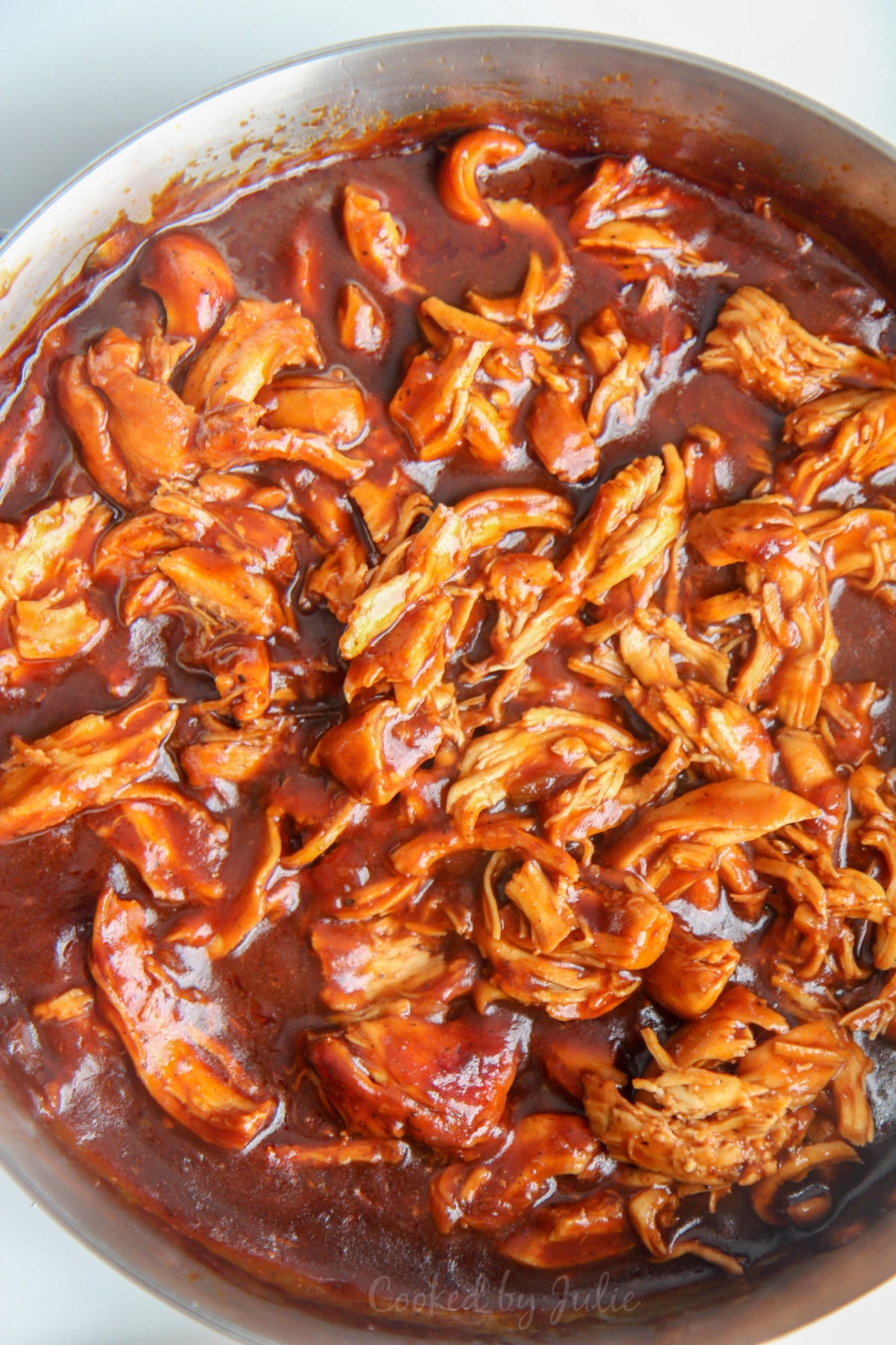bbq pulled chicken in a skillet 