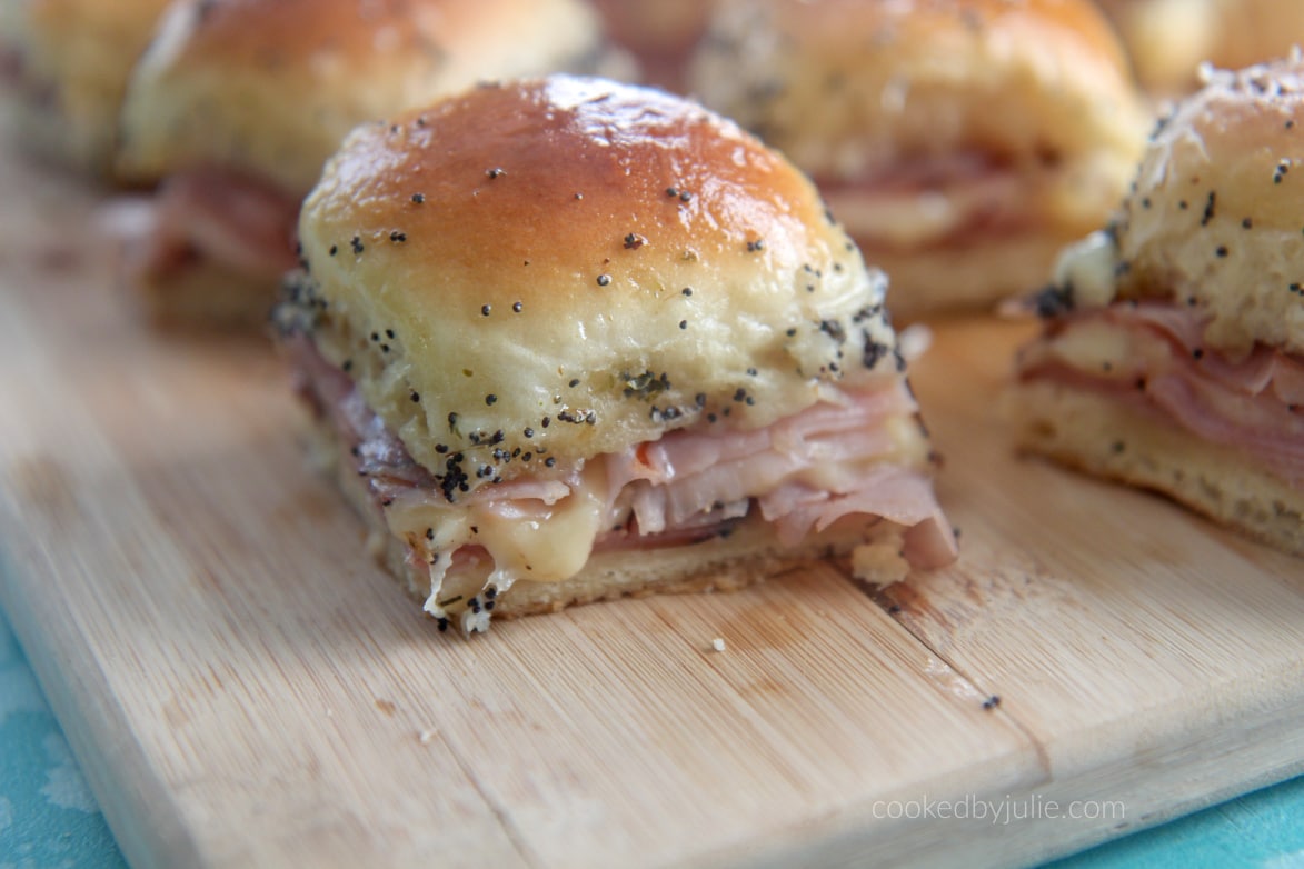 ham and cheese slider on a wooden board