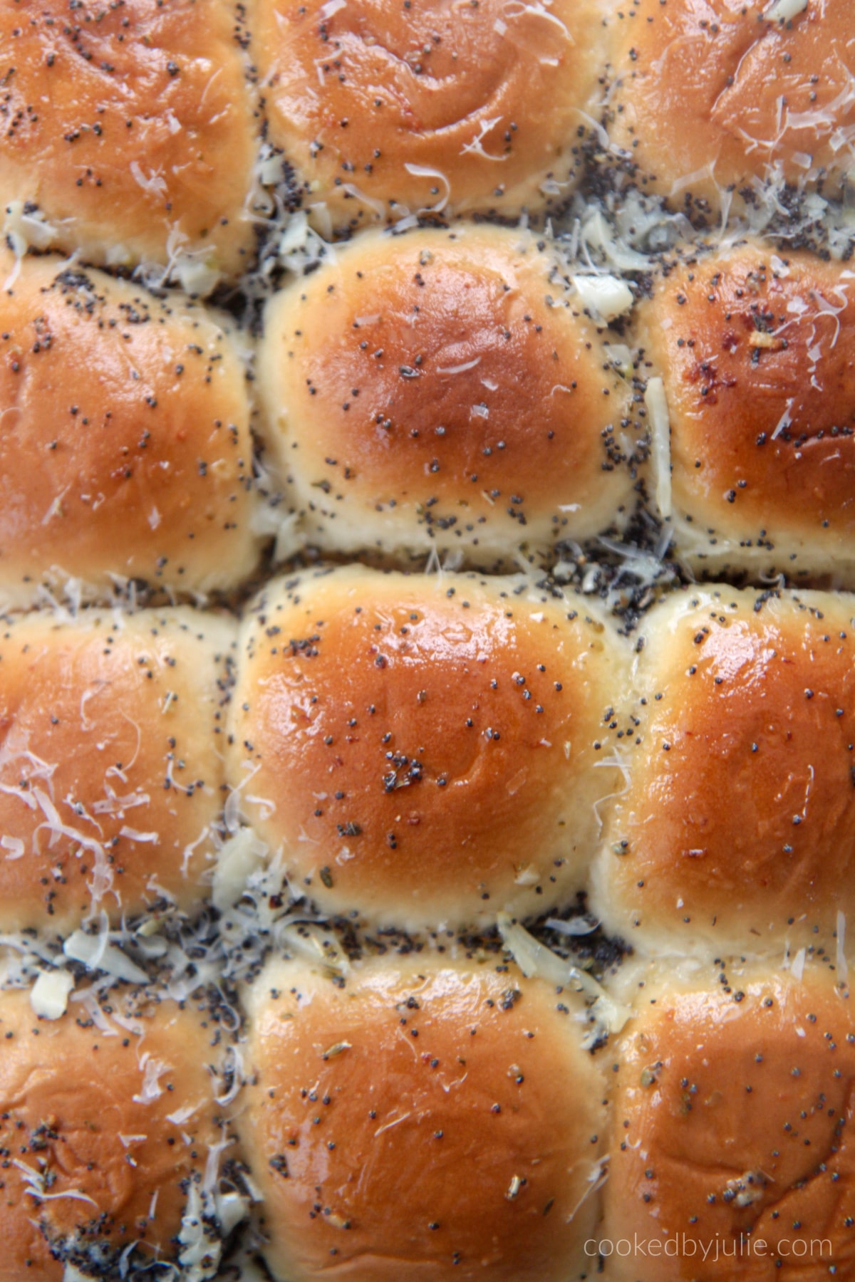 Hawaiian soft rolls brushed with a butter and poppy seed mixture