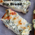 slices of spinach dip bread on a gray baking sheet