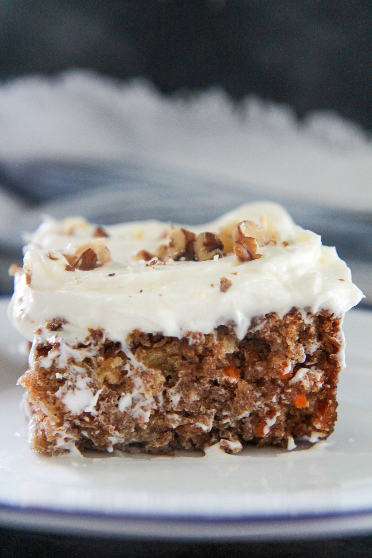 a slice of carrot cake up close 