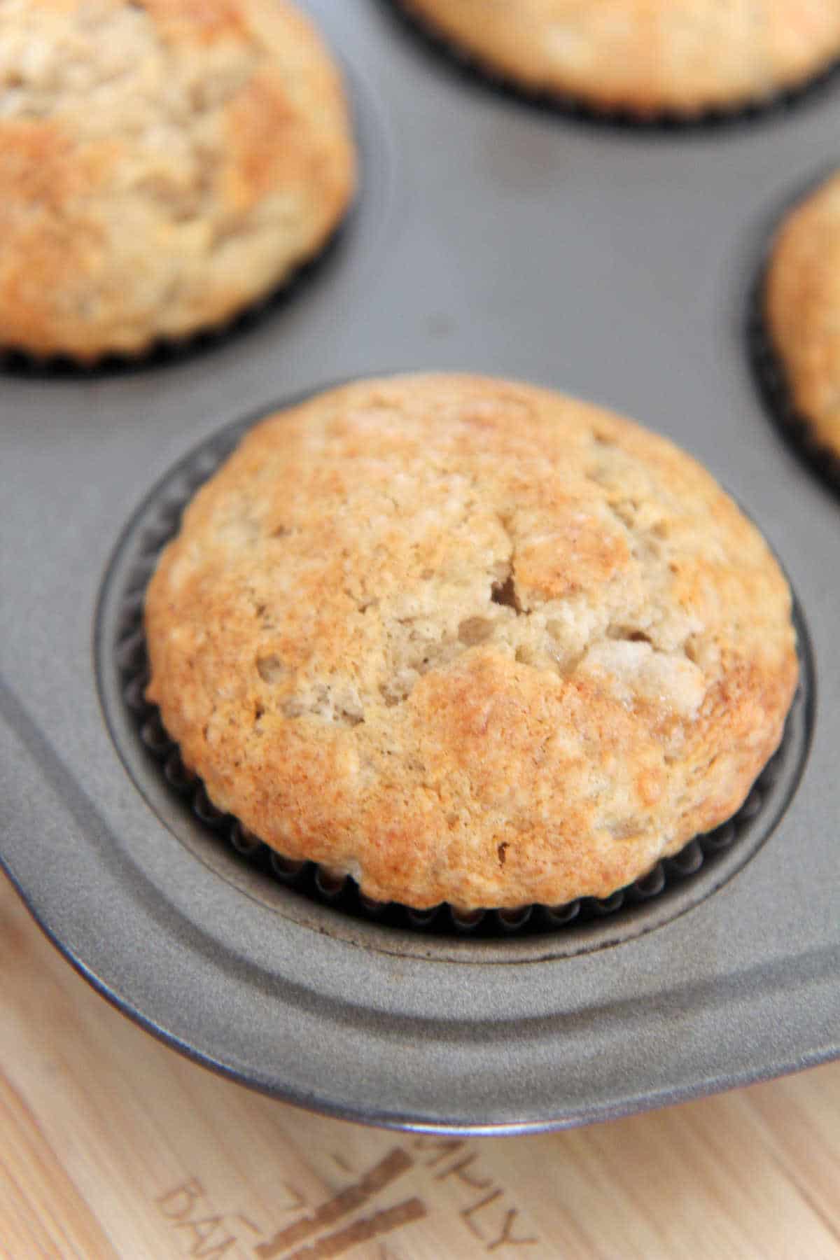 baked banana muffins in a muffin tin 