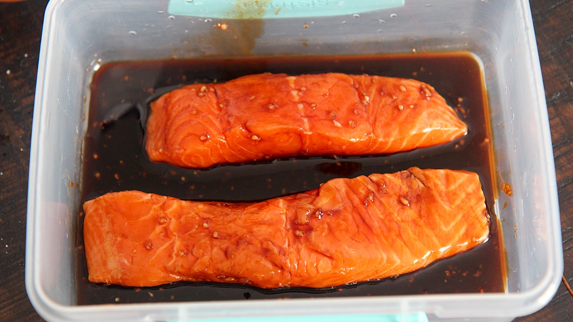 marinated salmon in a container