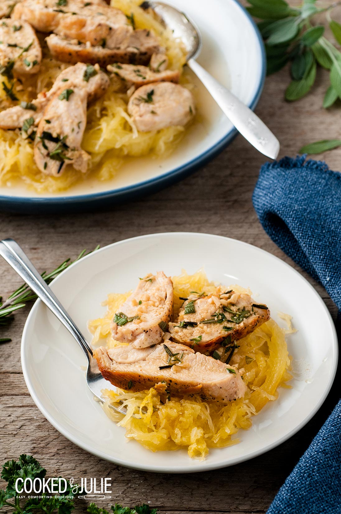 spaghetti squash and sliced chicken in a white bowl 