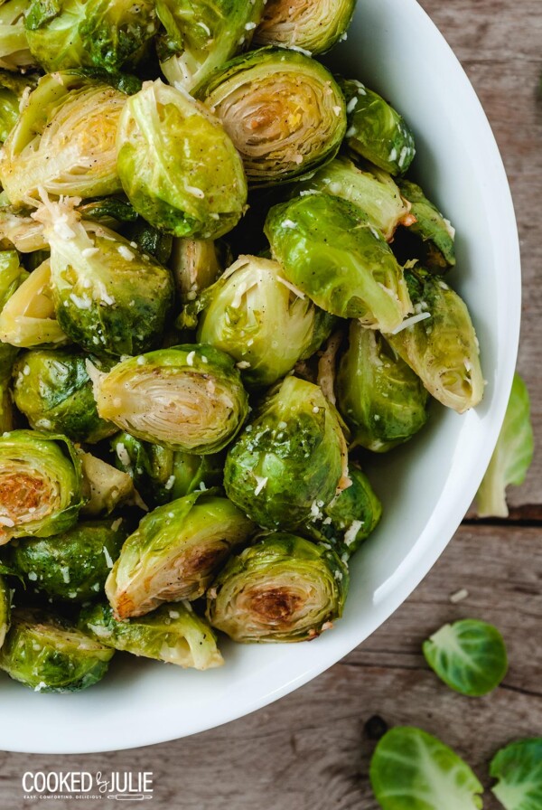 baked brussel spouts in a white bowl