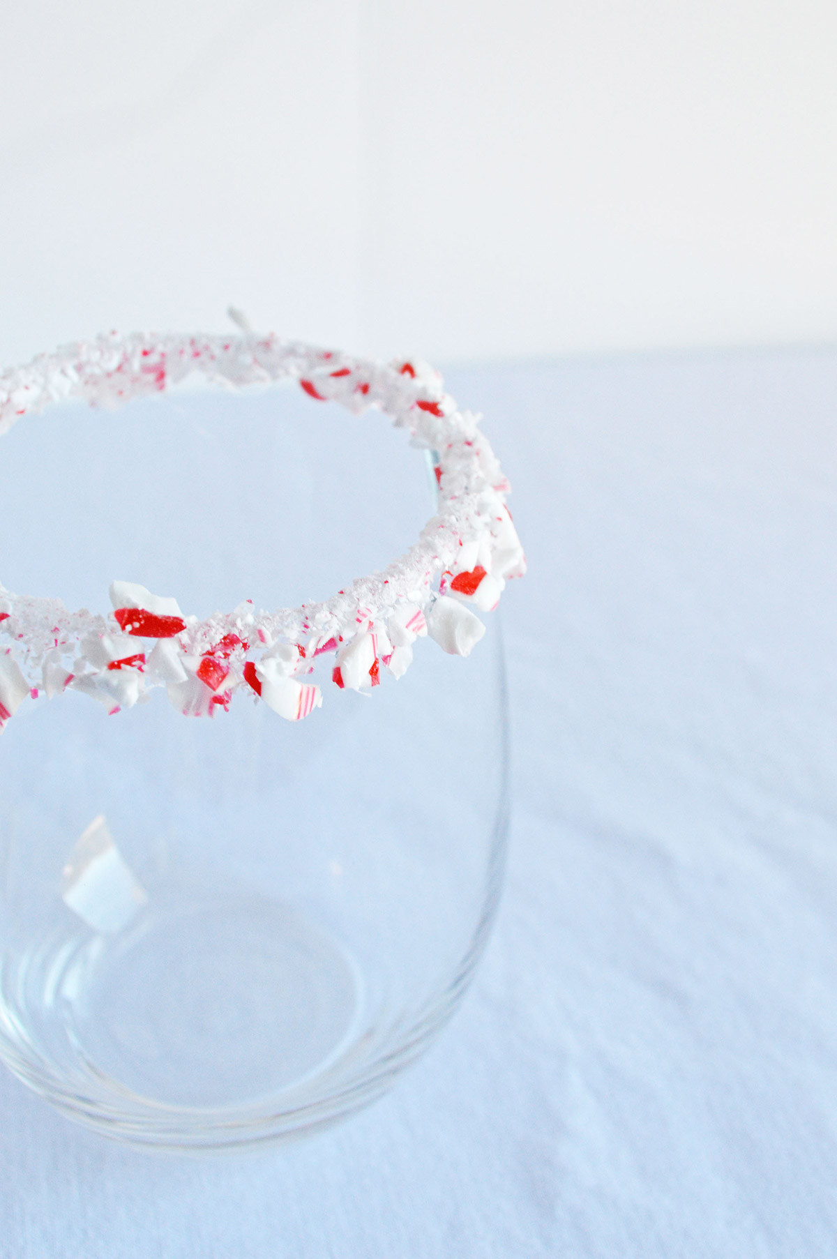 glass with a crushed candy cane rim 