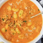 instant pot tomato gnocchi soup in a white bowl