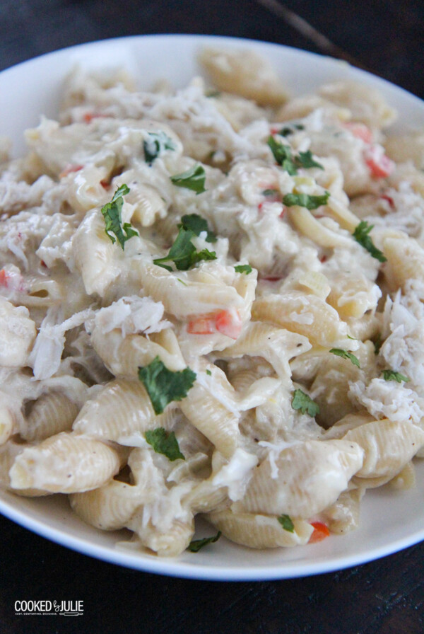 cheesy crab Alfredo pasta in a white bowl