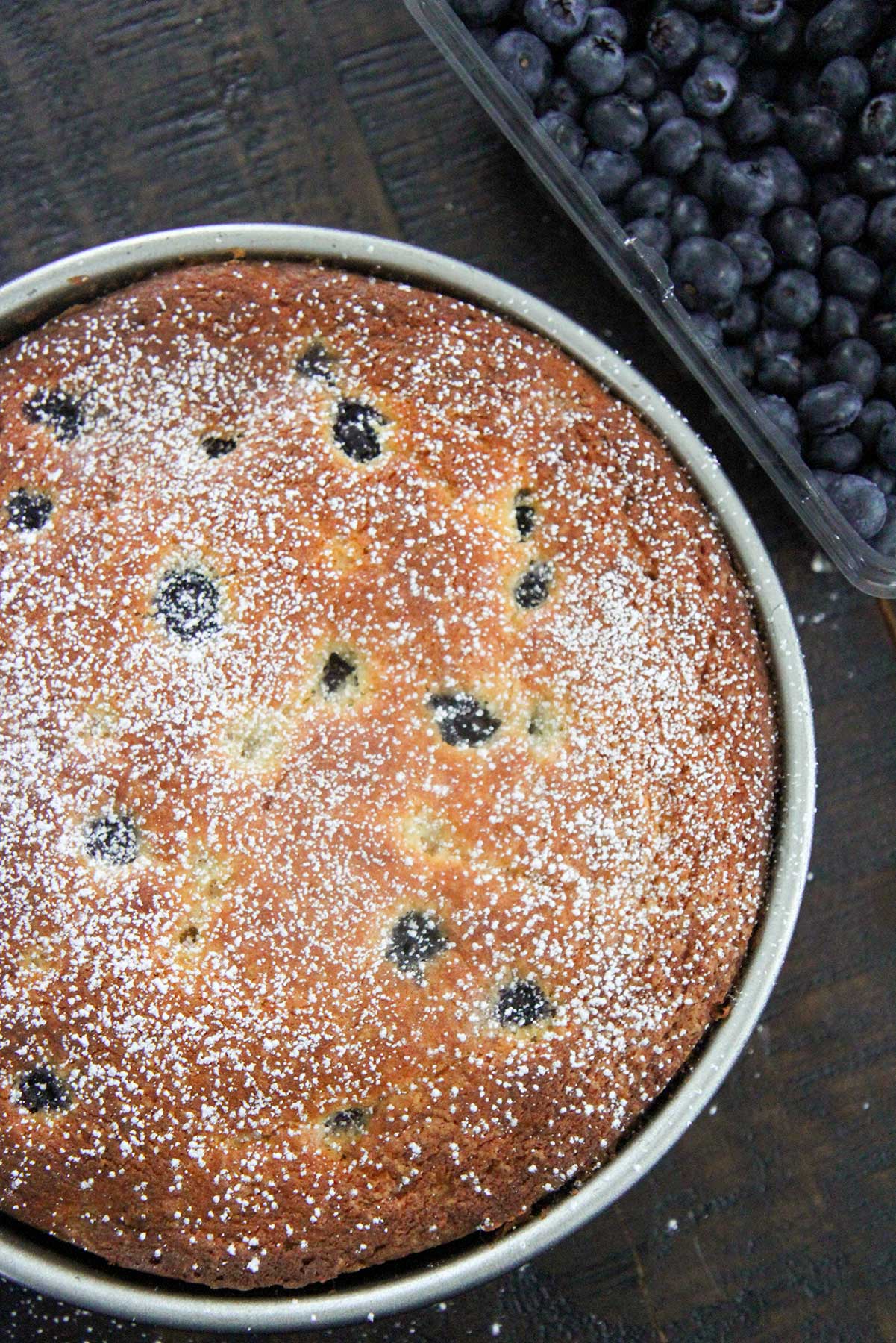 lemon blueberry cream cheese coffee cake with fresh blueberries on the side 