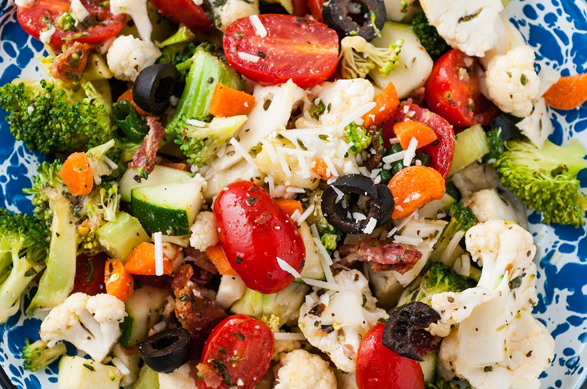 vegetable salad with homemade Italian dressing up close. 