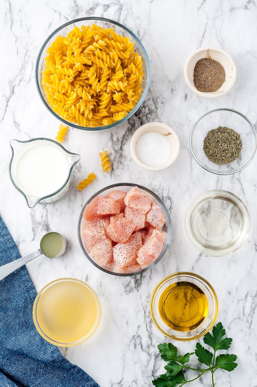 chicken, pasta, cream, thyme, oil, wine, and salt and pepper. 